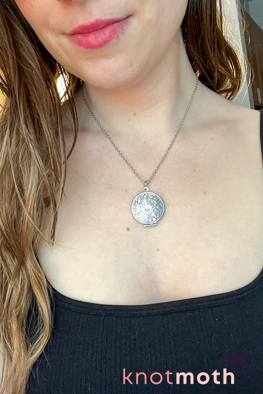 Rose, lily, daisy, and sunflower (love, loyalty, & gratitude) floriography micro-crochet locket