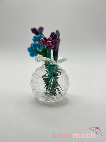 micro crochet flower arrangement in glass vase