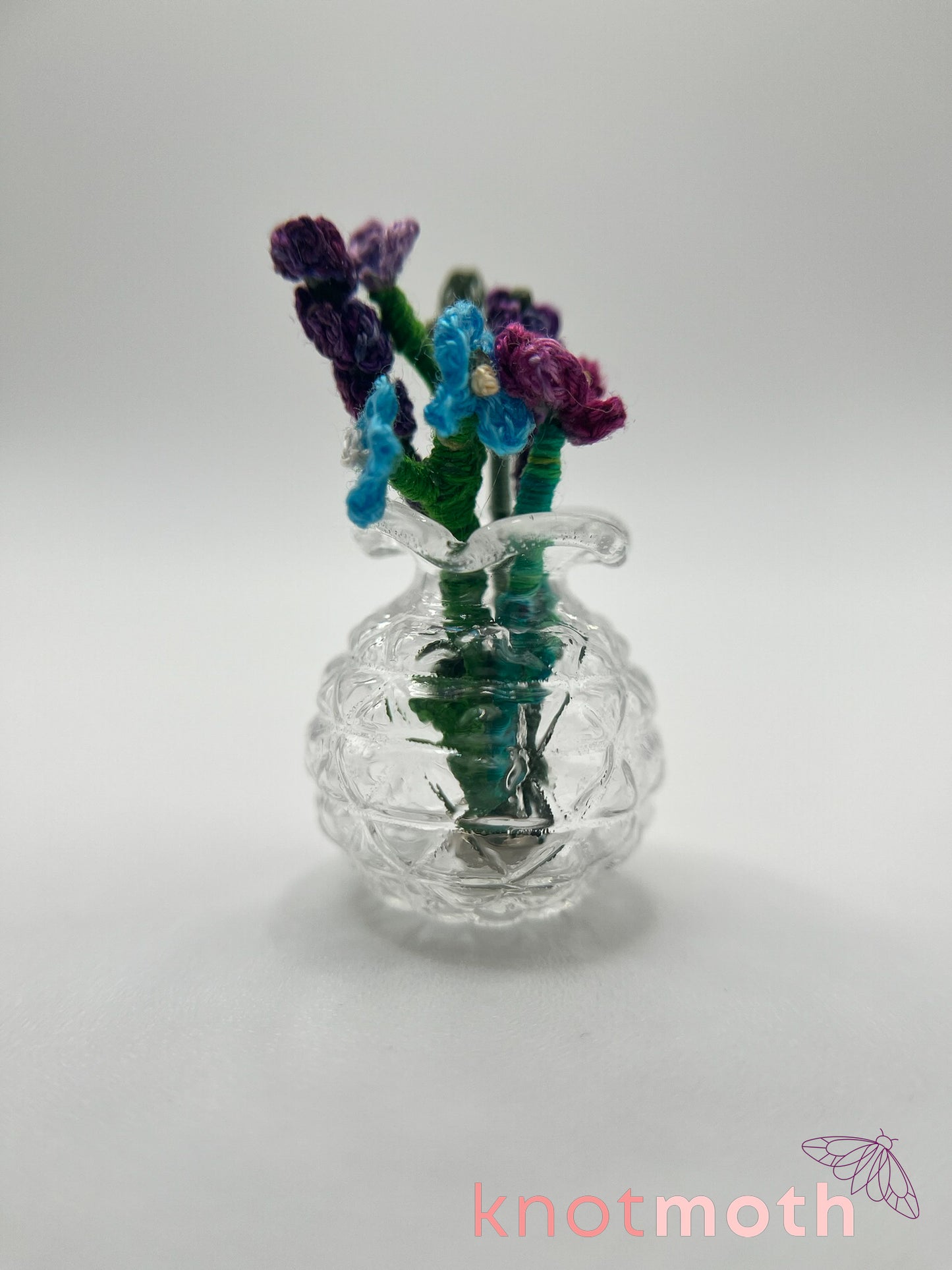 micro crochet flower arrangement in glass vase