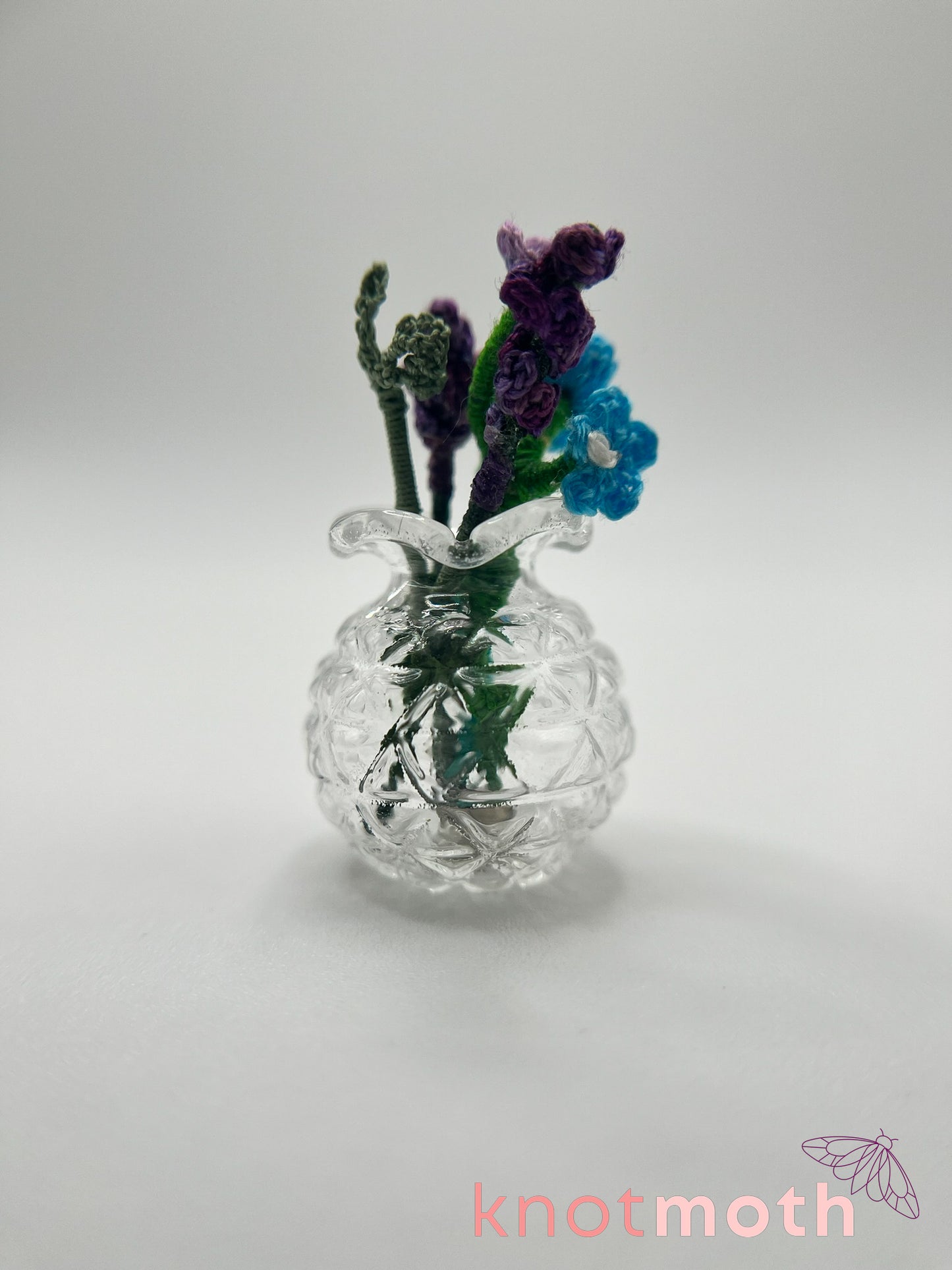 micro crochet flower arrangement in glass vase