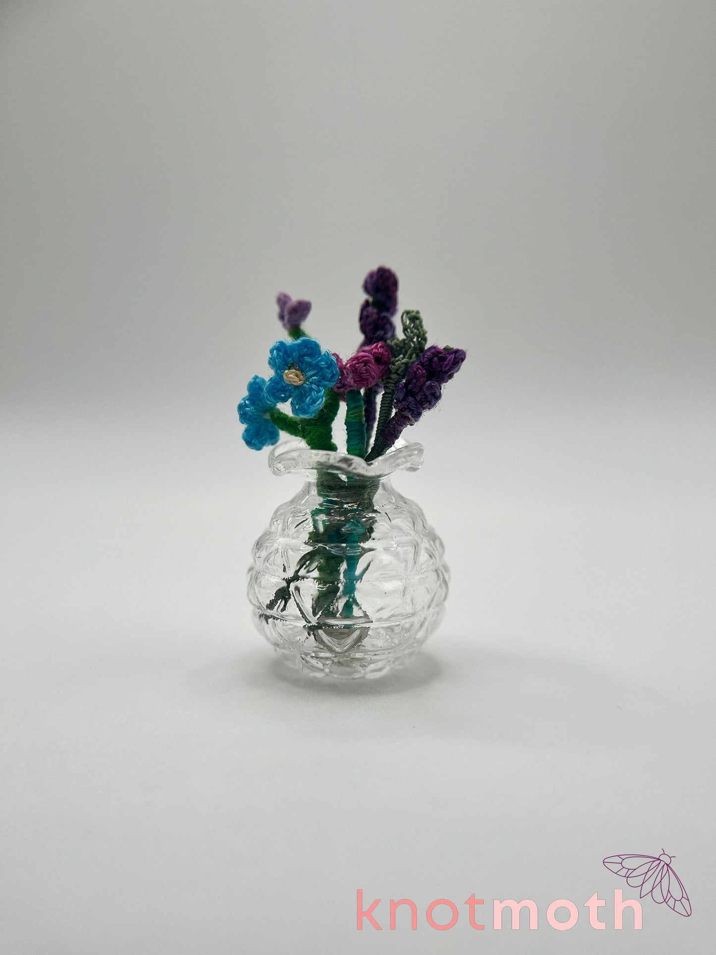 micro crochet flower arrangement in glass vase