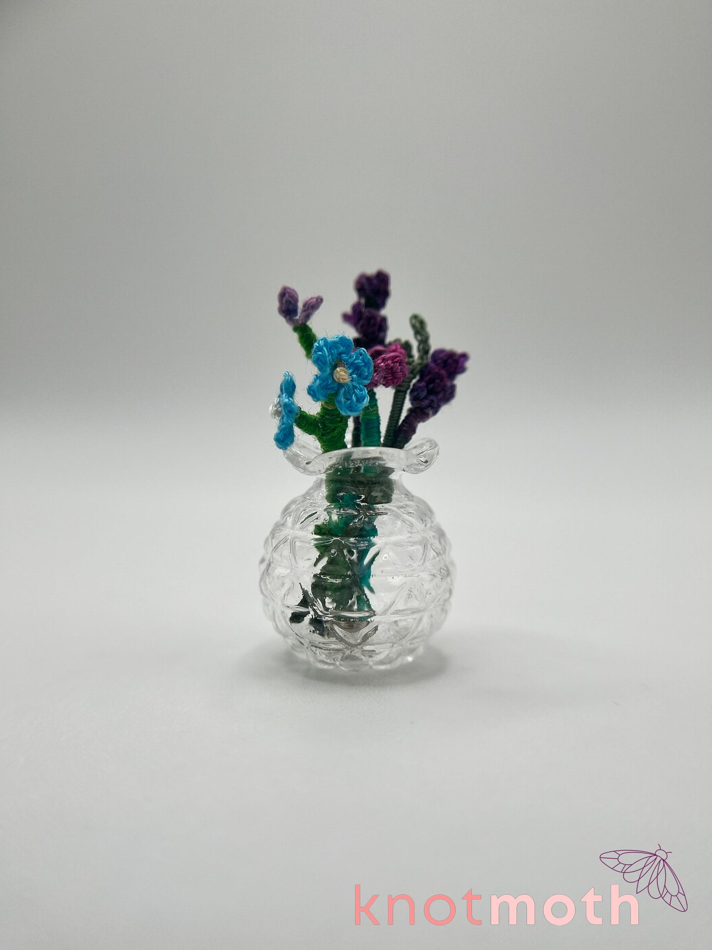 micro crochet flower arrangement in glass vase