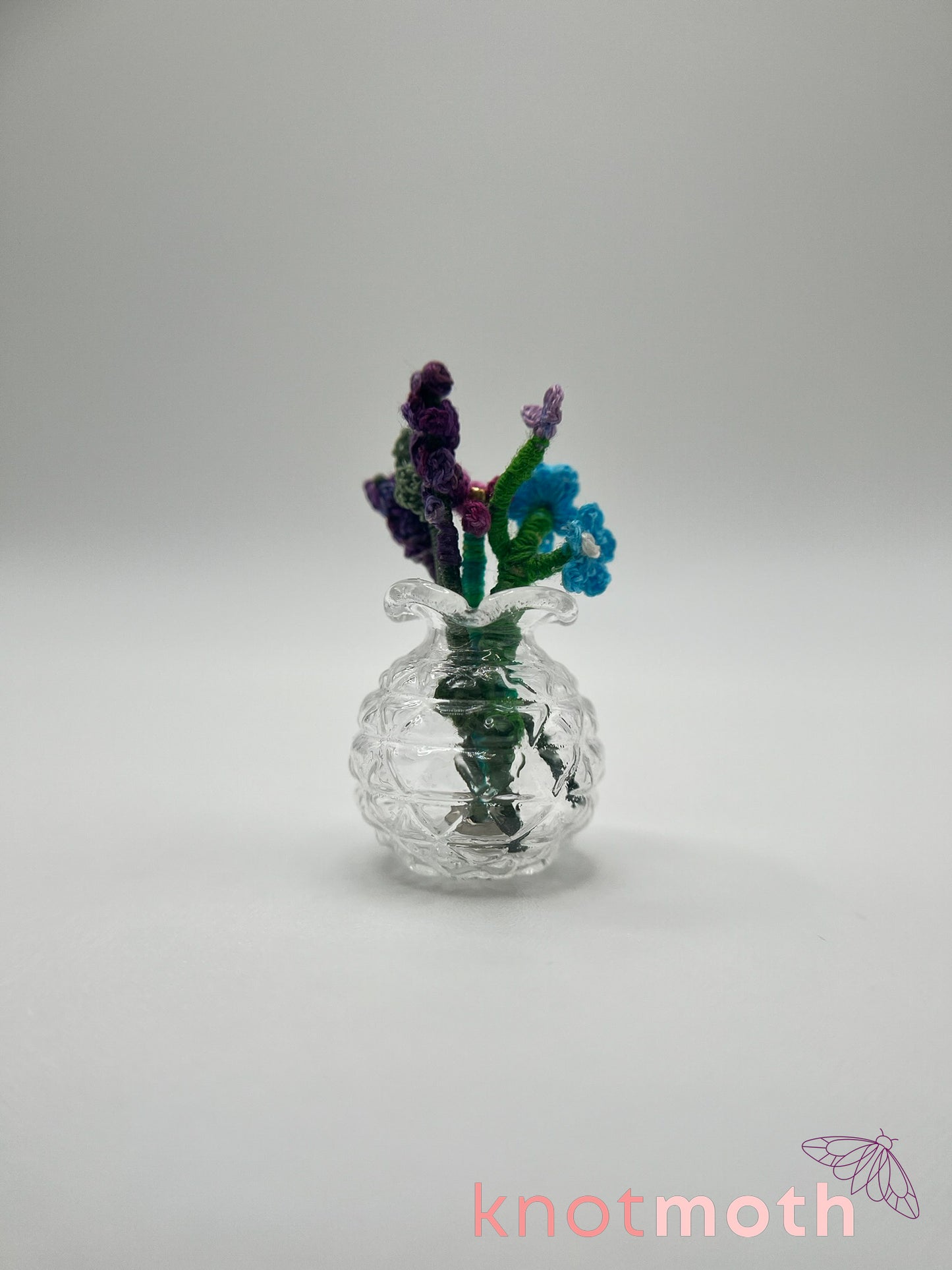 micro crochet flower arrangement in glass vase