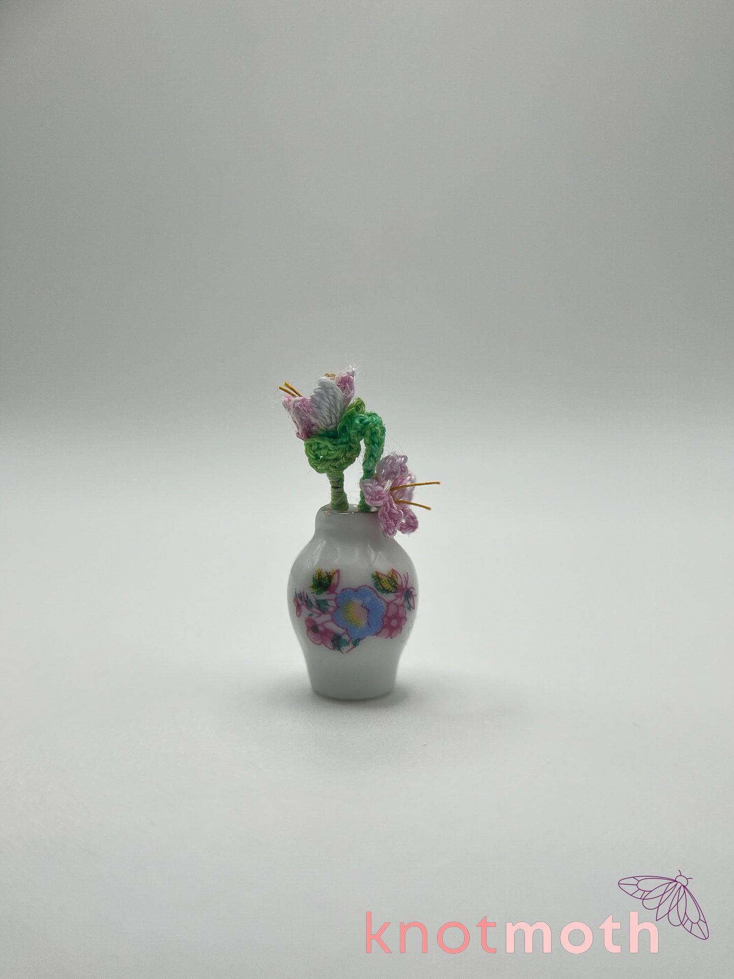 micro crochet flower arrangement in ceramic vase