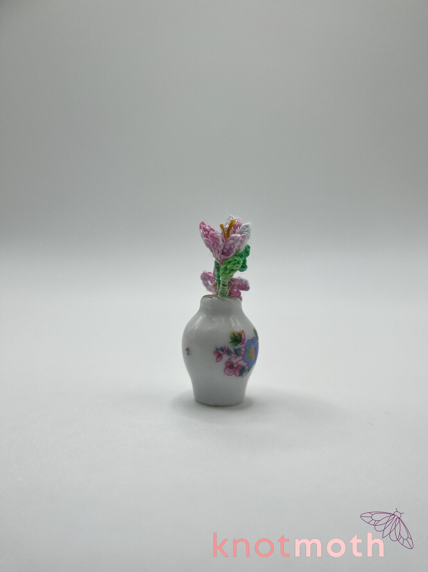 micro crochet flower arrangement in ceramic vase