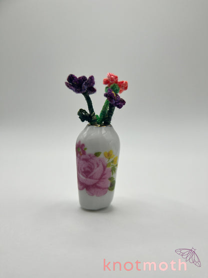 micro crochet flower arrangement in ceramic vase