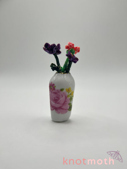 micro crochet flower arrangement in ceramic vase
