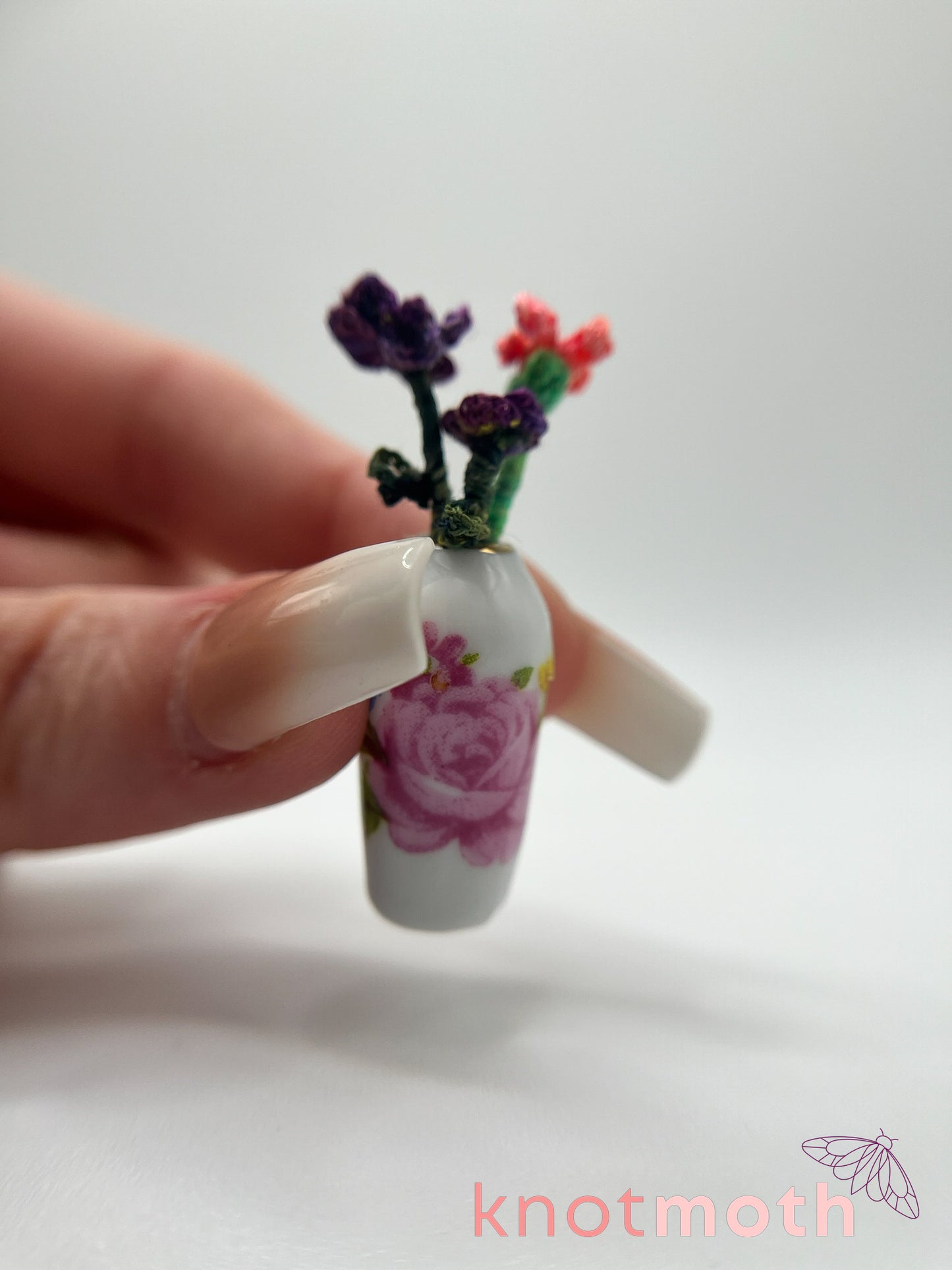micro crochet flower arrangement in ceramic vase