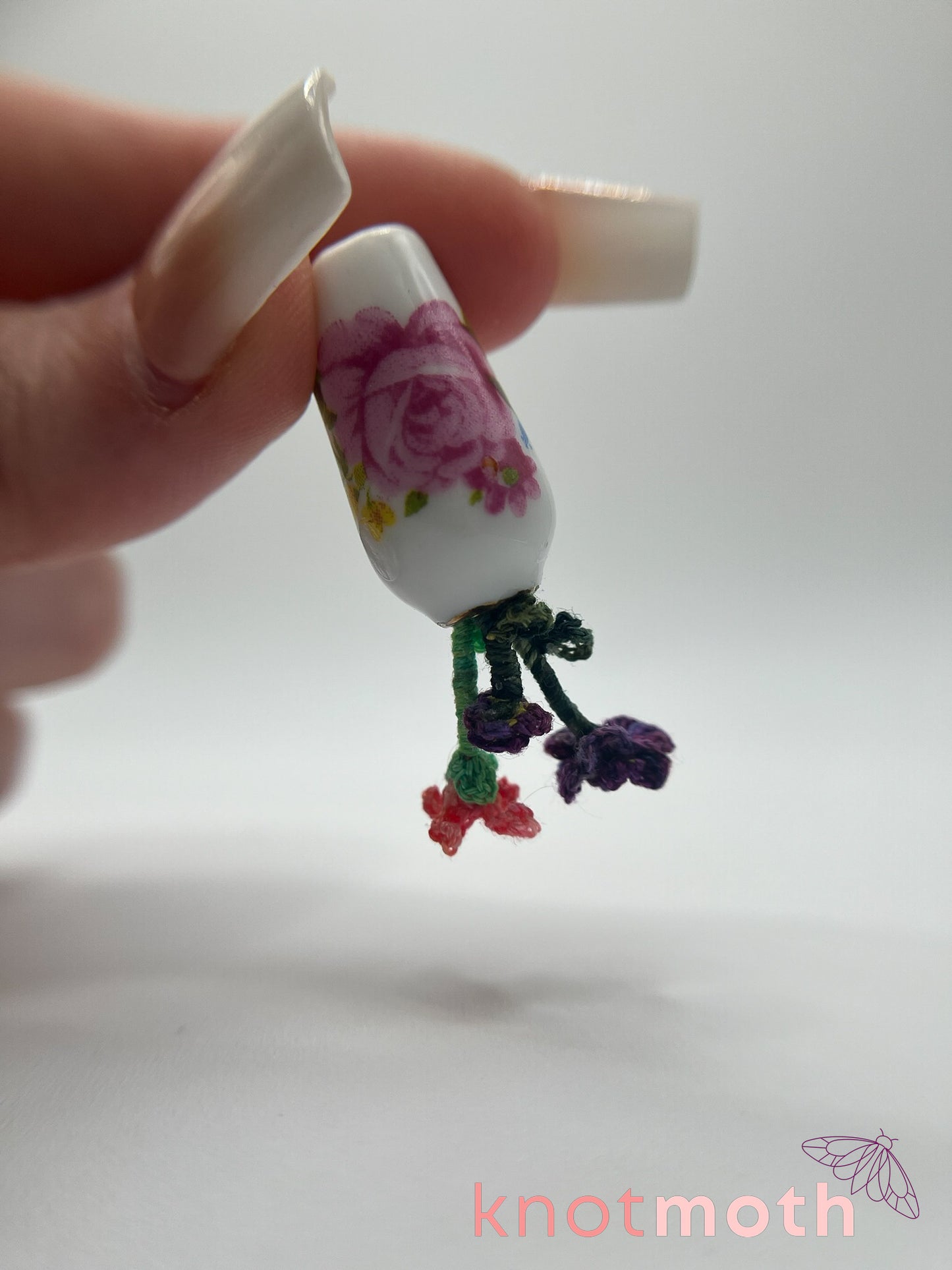 micro crochet flower arrangement in ceramic vase