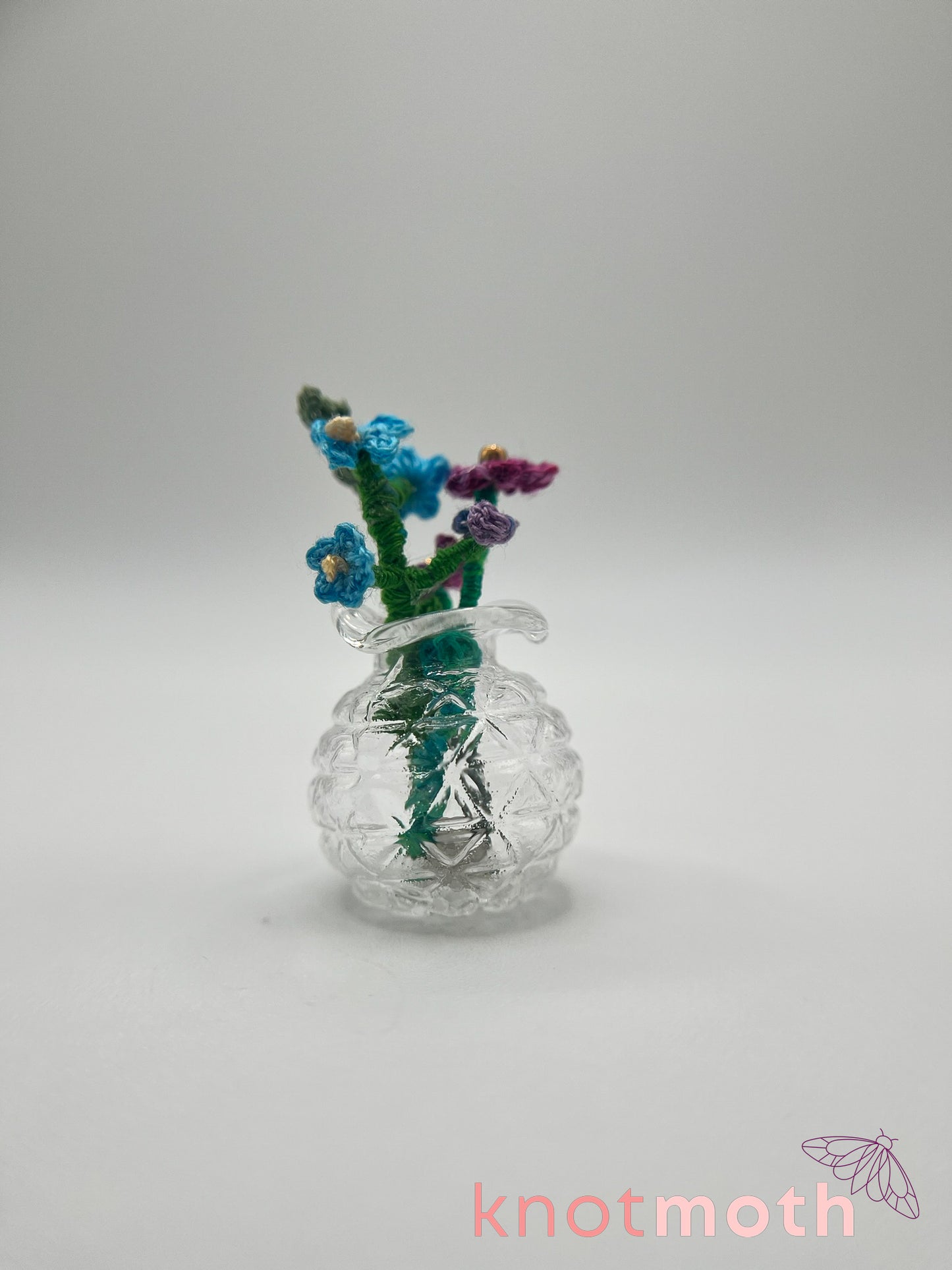 micro crochet flower arrangement in glass vase