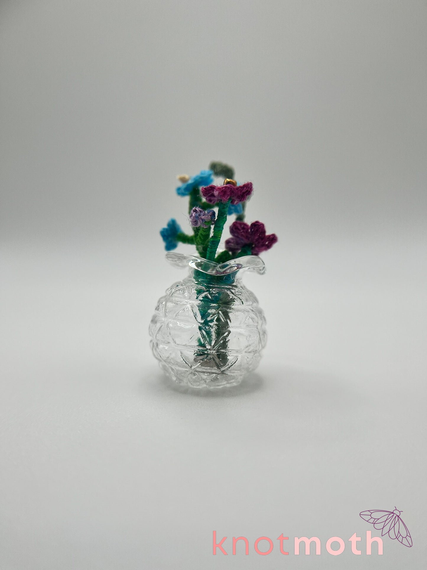 micro crochet flower arrangement in glass vase