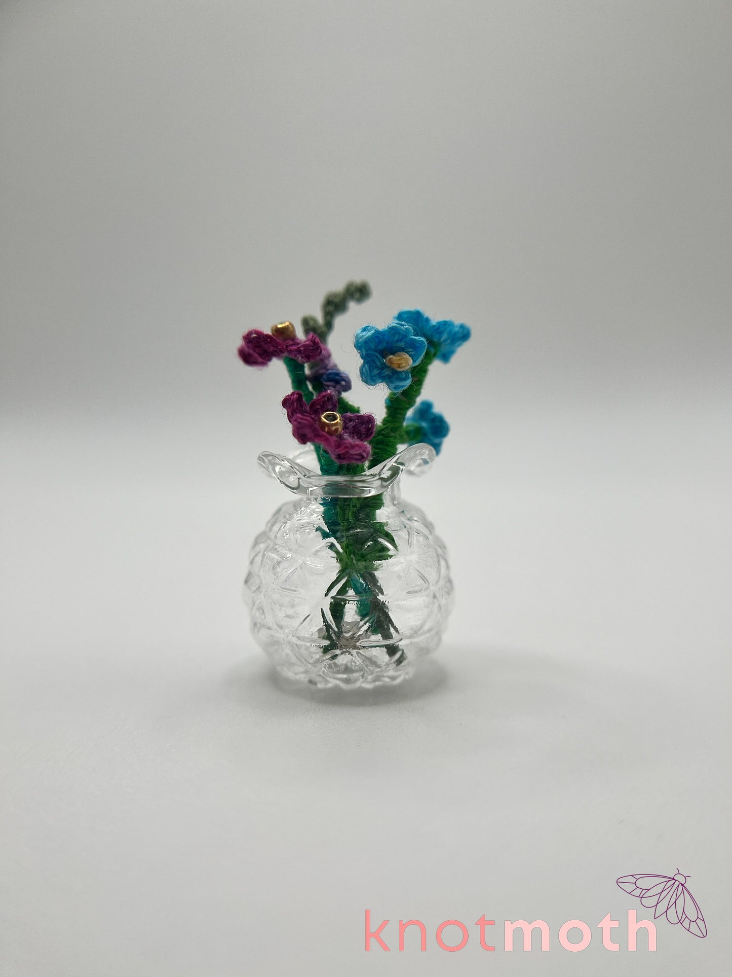 micro crochet flower arrangement in glass vase