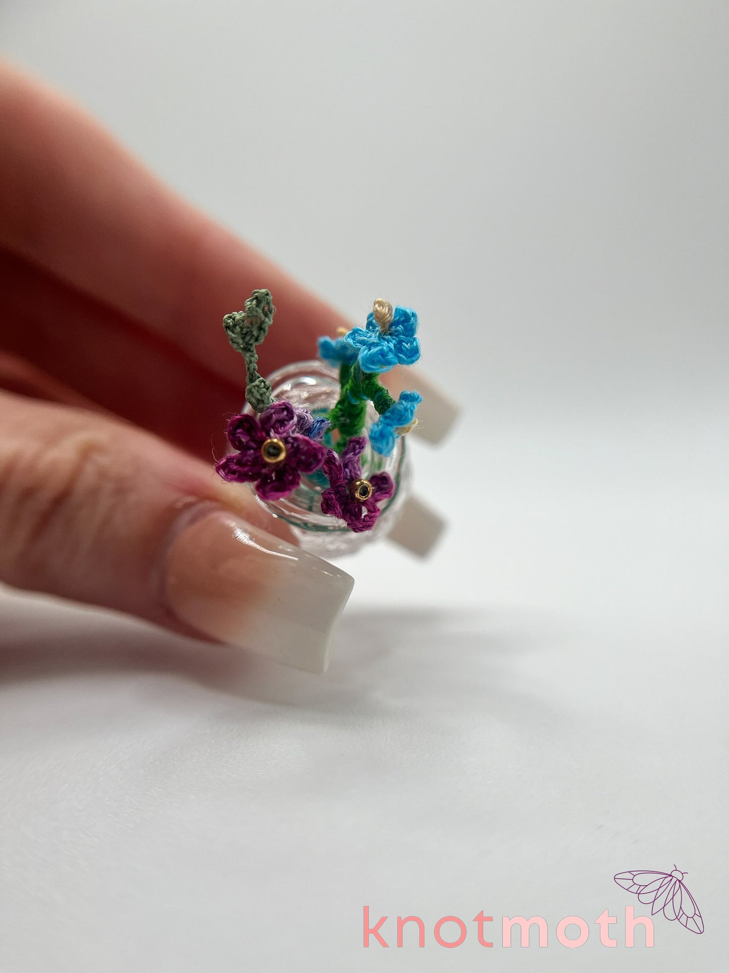 micro crochet flower arrangement in glass vase