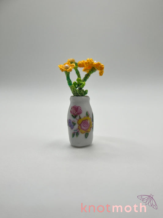 micro crochet flower arrangement in ceramic vase
