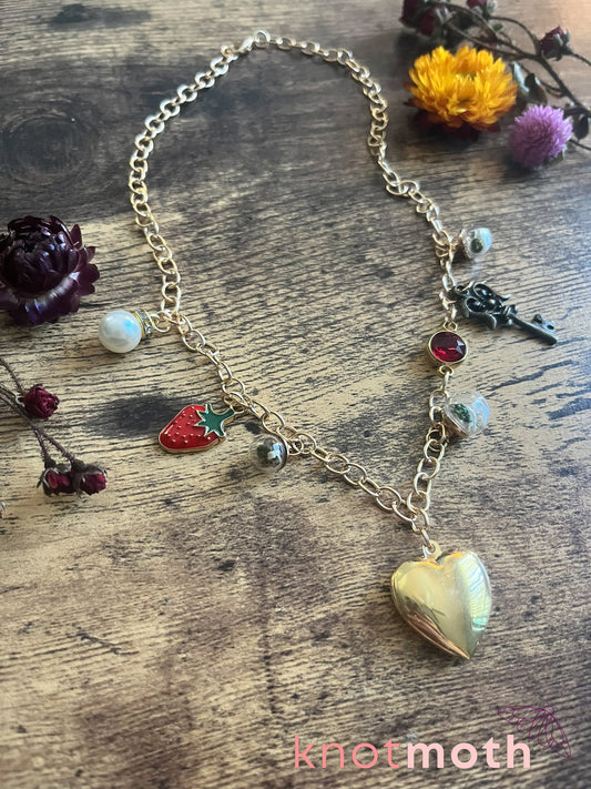 locket & charm necklace with micro crochet details