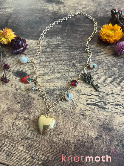 locket & charm necklace with micro crochet details
