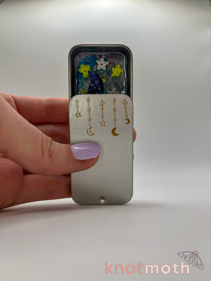 clover cow · moon & flowers nighttime mini tin