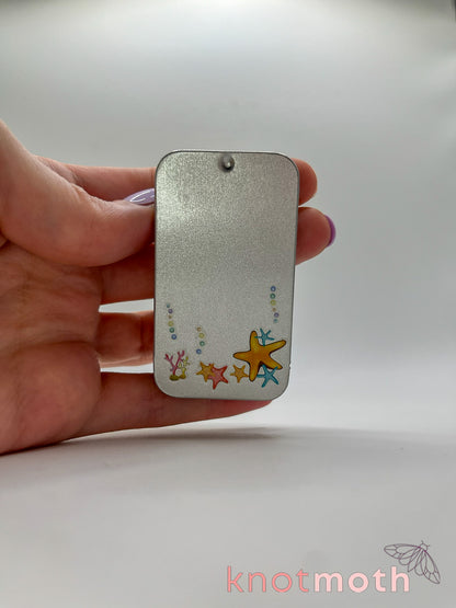 saxon seal · kelp forest mini tin