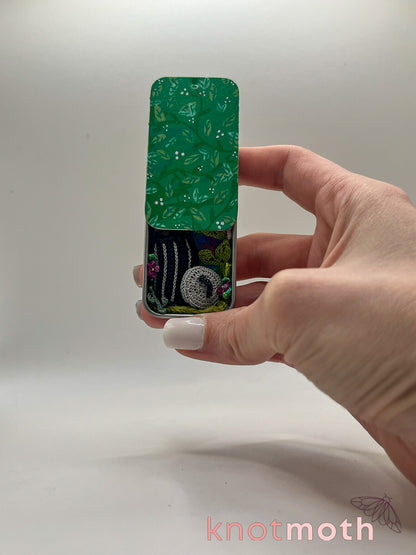 trash possums with pizza mini tin