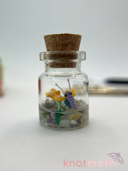 shae snail micro crochet jar with yellow daisies