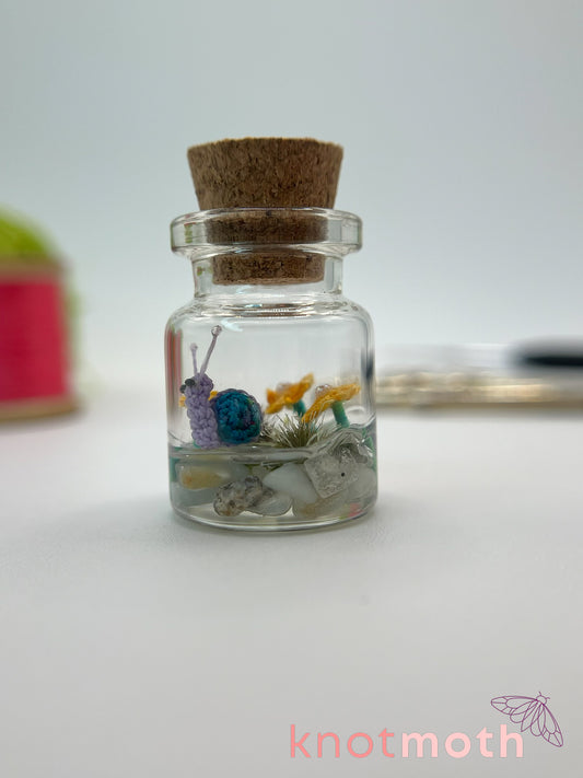shae snail micro crochet jar with yellow daisies