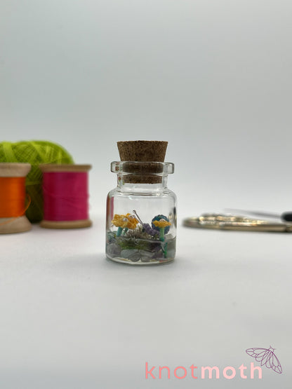 shae snail micro crochet jar with yellow daisies