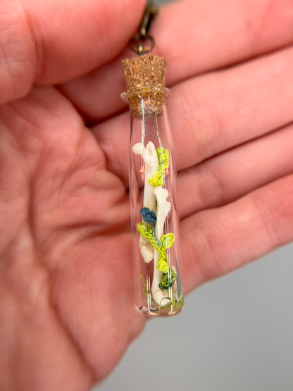 flowers, vine, & paired femora - bone garden vial necklace