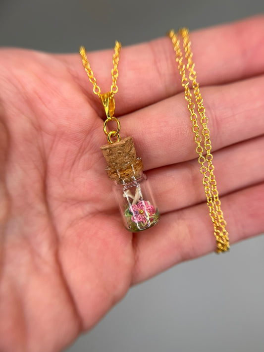 pink flower & humerus bone pair - bone garden necklace