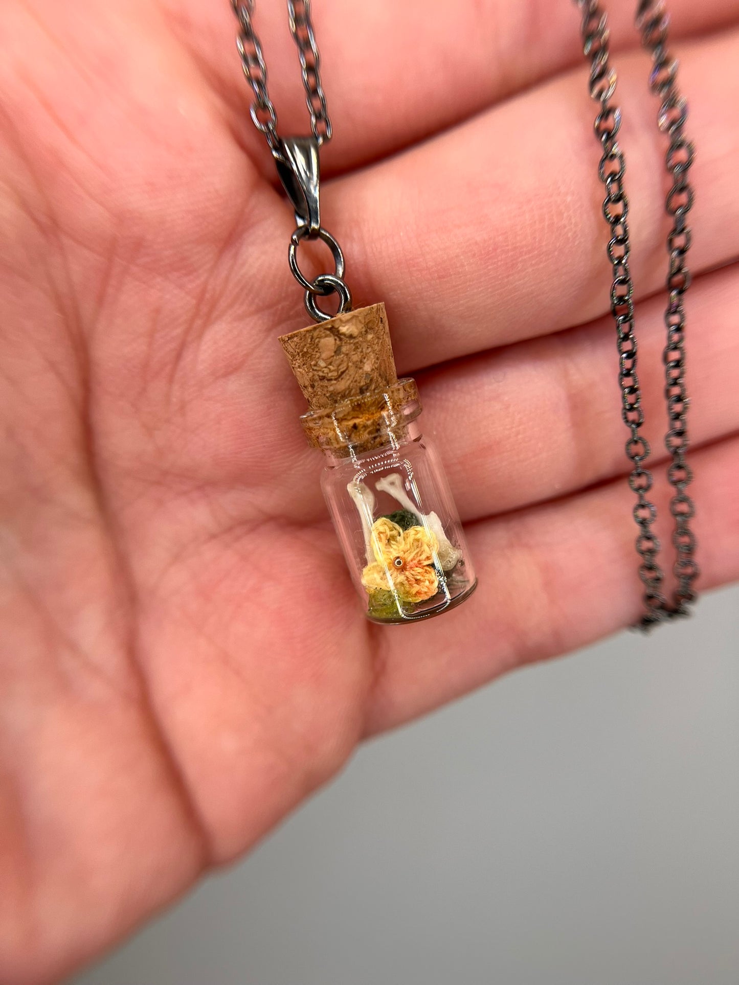 yellow flower & humerus bone pair - bone garden necklace