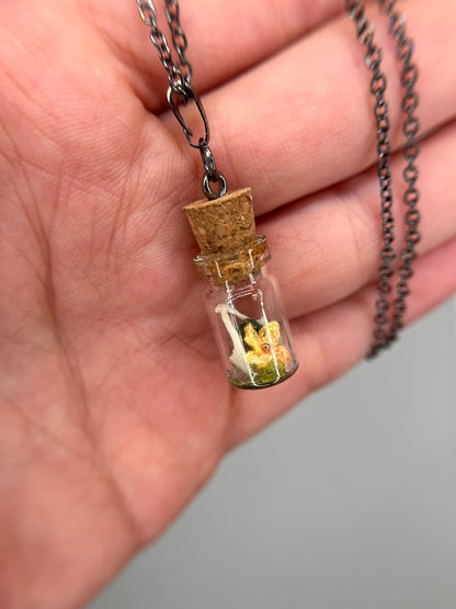 yellow flower & humerus bone pair - bone garden necklace