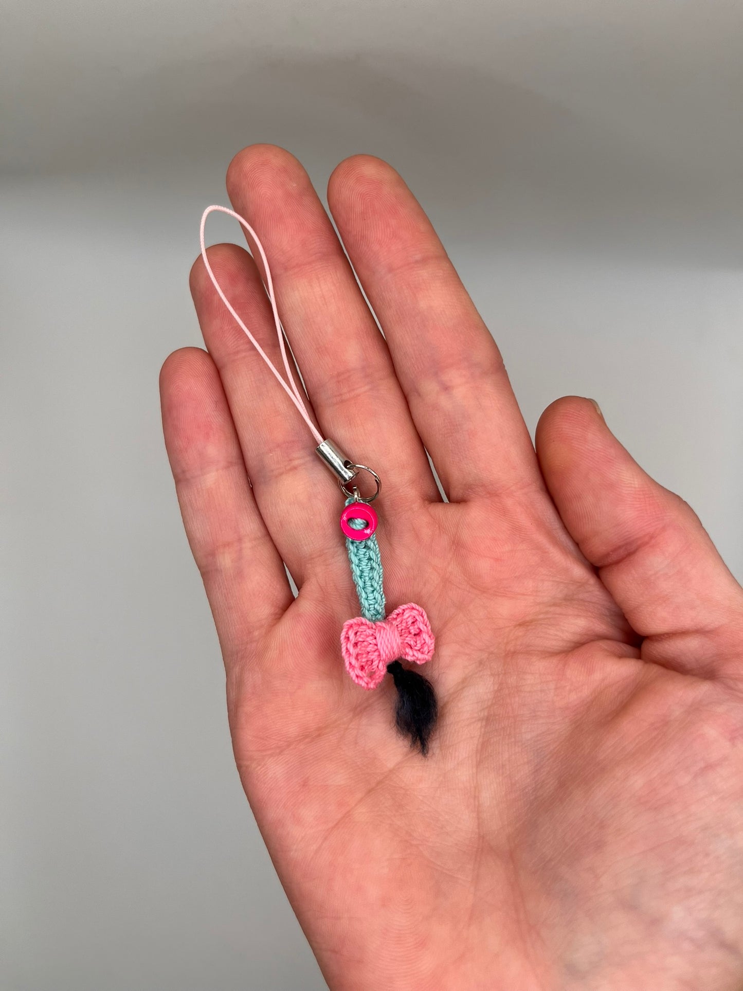 depressed donkey tail keychain