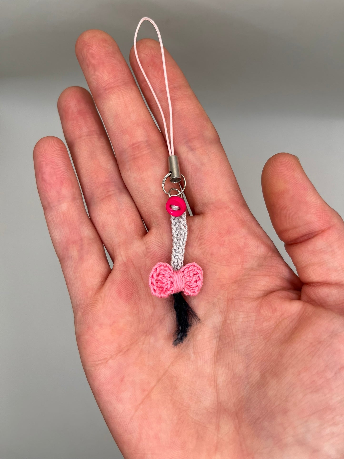 depressed donkey tail keychain