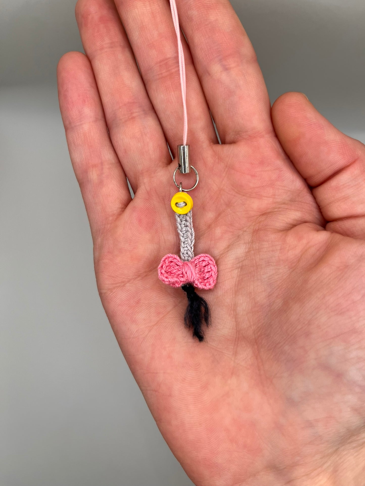 depressed donkey tail keychain