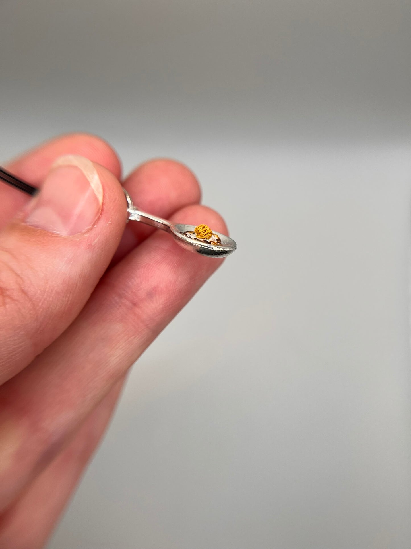 tiny fried egg keychain